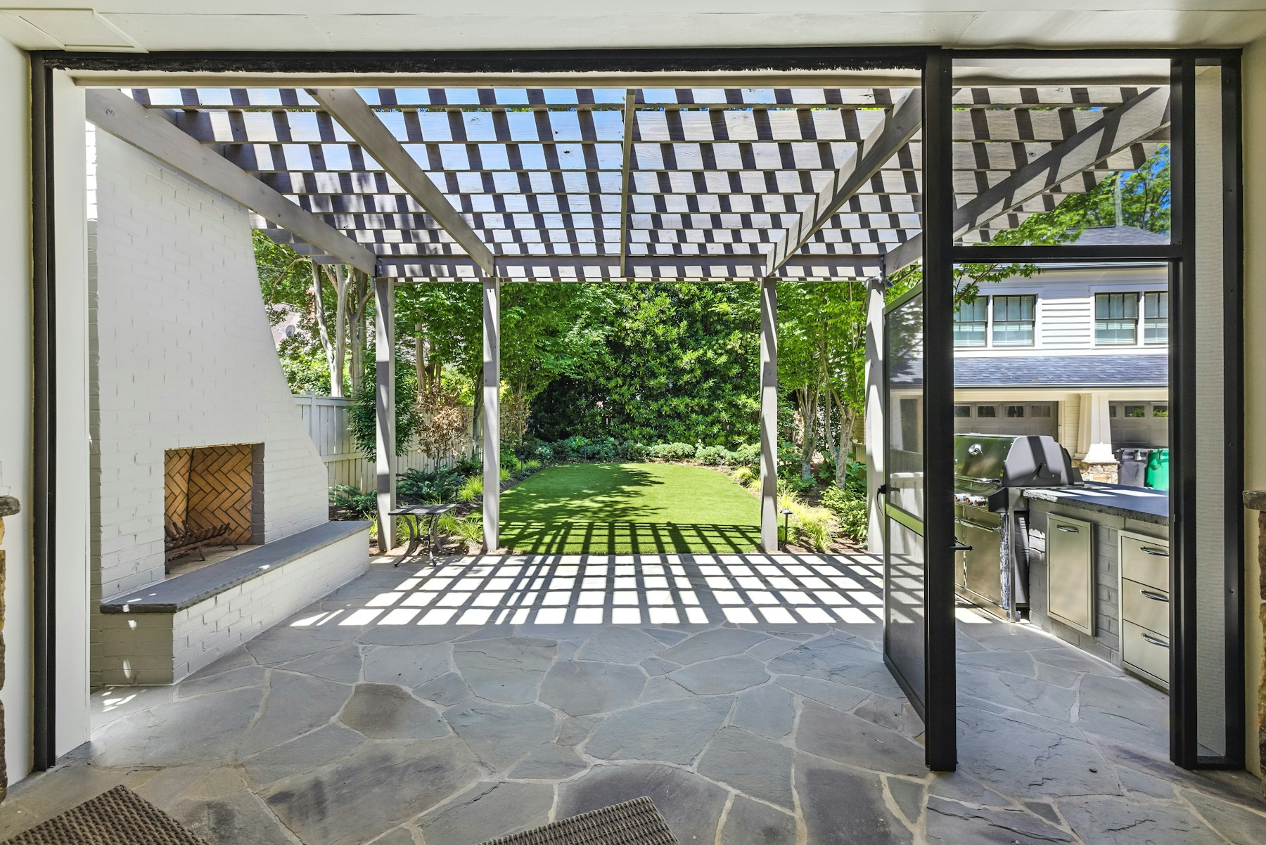 Covered patio and outdoor kitchen design inspiration